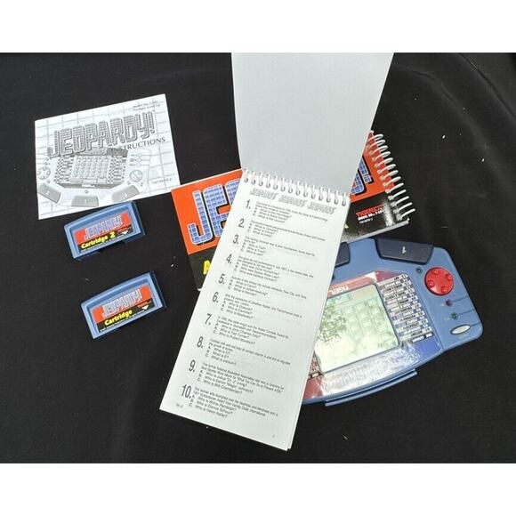 1995 Jeopardy Handheld Game Tiger Electronics Tested 2 Cartridge & Books -A75 - Picture 9 of 9